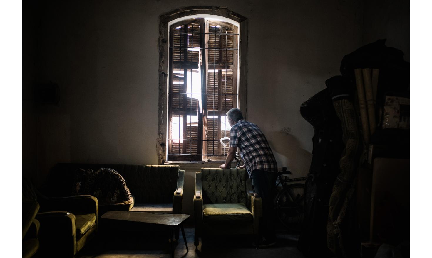 © Stéphane Lagoutte / MYOP District of Quarantina. The family of Georges (Lebanese with Greek origins) has been renting this house for 70 years. It is one of the first houses in this neighbourhood. The windows were torn out, only his sister was present at the time of the explosion.