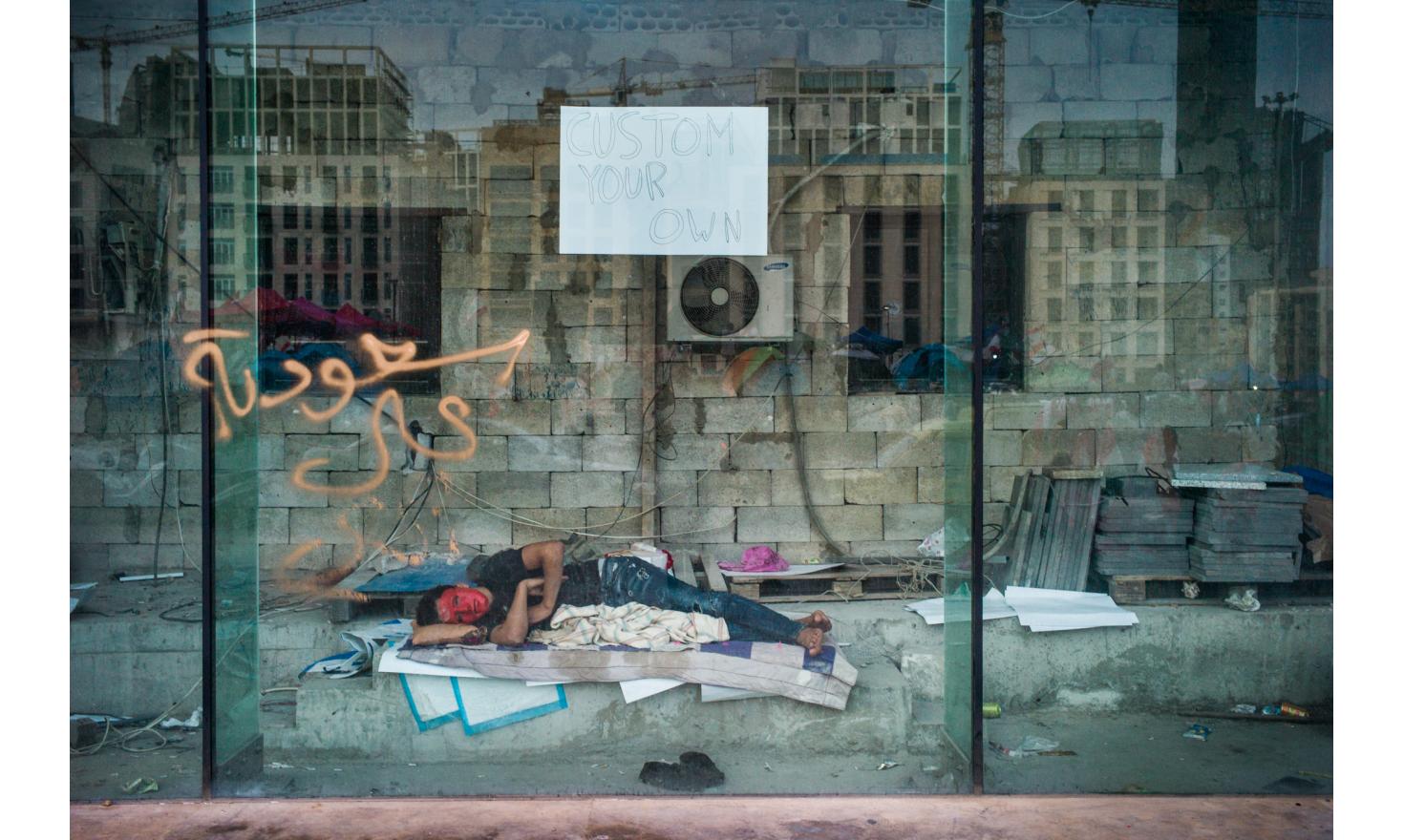 Beirut city center, Lebanon, October 25. Demonstrators camp night and day in the Martyrs' Square in the city centre. Here in a shop under construction on Martyrs Square.