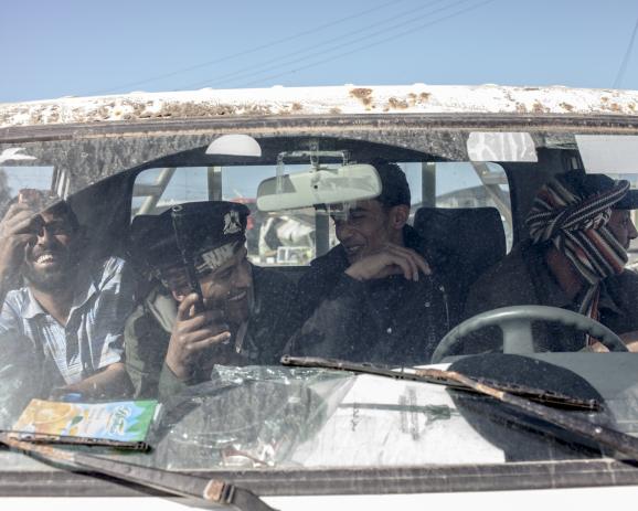 On the road to Syrte /  Eastern Libya / - Benghazi, Ajdabiya, Brega, Ras Lanuf, ...Rebels in Libya have been celebrating after fighting off an attempt by troops loyal to Col Muammar Gaddafi to retake the eastern oil port of Brega. Insurgent in Ras Lanouf.
